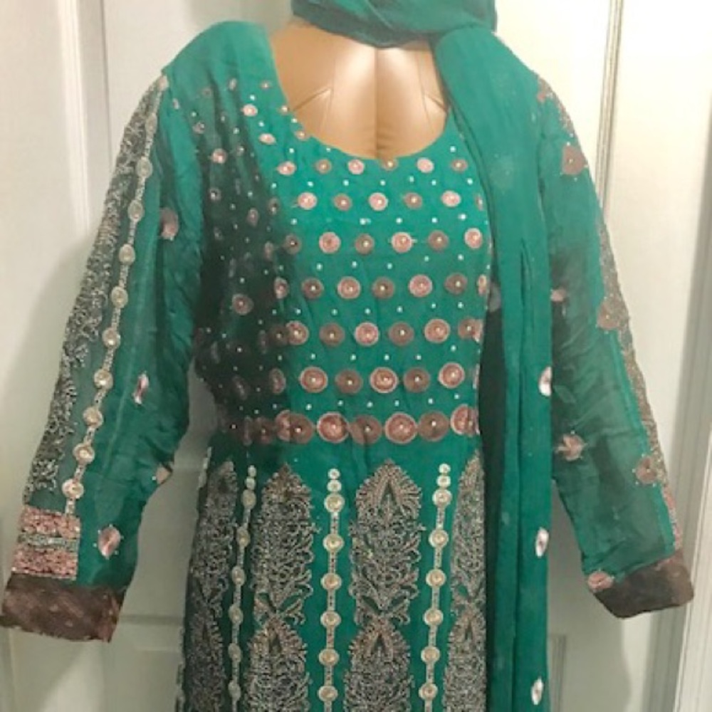 Green dress with silver and brown work